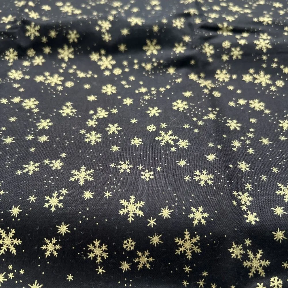 Wonders of Winter Black Gold Snowflake Quilting Fabric Laurie Godin Northcott
